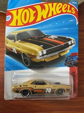 Mattel Hot Wheels Gold Dodge 70 hemi Race Car with Black and Orange Stripes